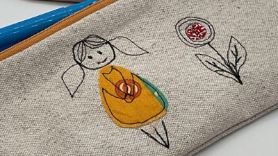Trousse pour enfant avec la technique de broderie en piqué libre apprise lors de l'atelier et du stage avec Ingrid vers Toulouse